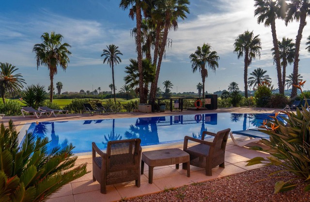 Comfortable apartment in a well-maintained residential complex with communal pool.