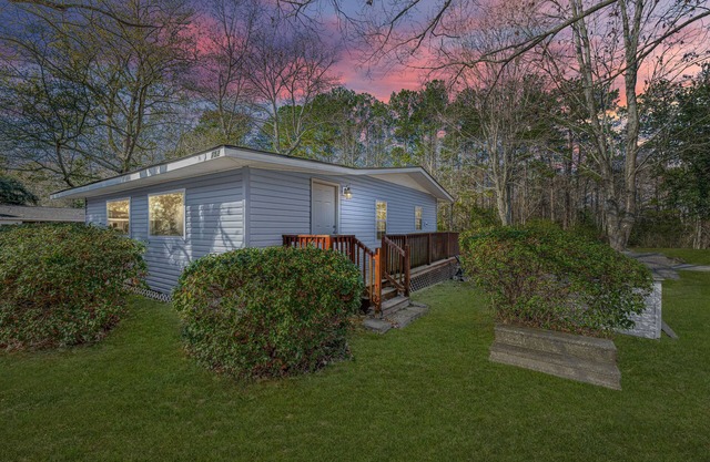 Completely renovated lake house with boat landing, dock, fire pit and deck!