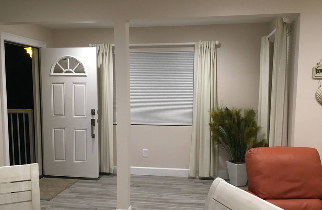 Completely renovated, canal front with dock, gulf home