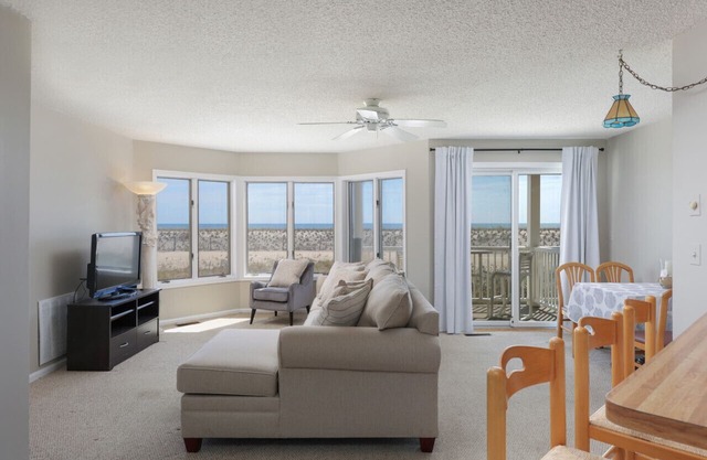 Condo on the beach with private patio overlooking the ocean.