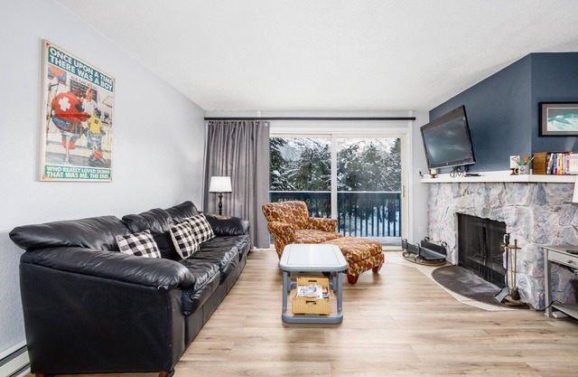 Condo with lanai, mountain view, fireplace, & spiral staircase