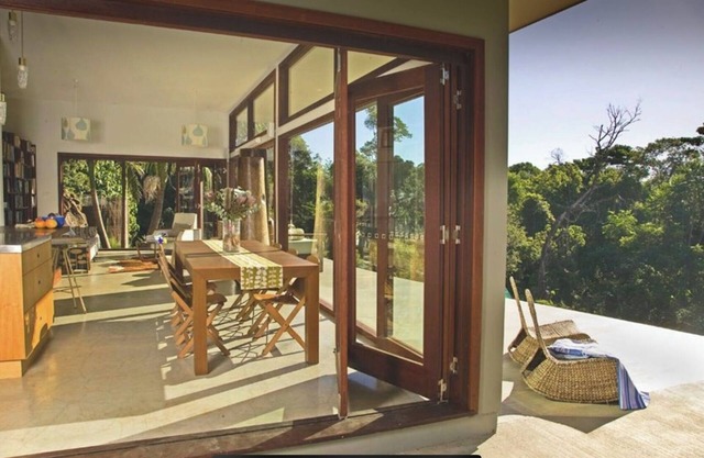 Contemporary eco house with plunge pool overlooking the rainforest