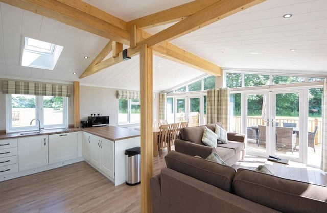 Contemporary luxury lodge with luxurious king-size bed.