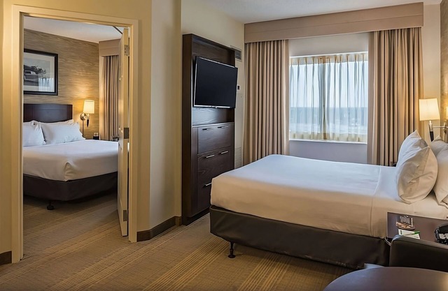 Convenience & Comfort! w/Airport Shuttle Service, Pet-friendly Property!
