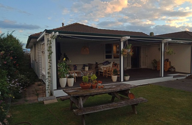 Cosy character home with fireplace, private backyard & deck.