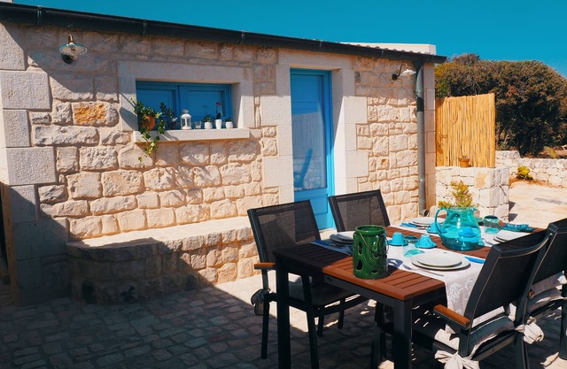 Cottage nestled in the Mediterranean bush a stone's throw from the sea