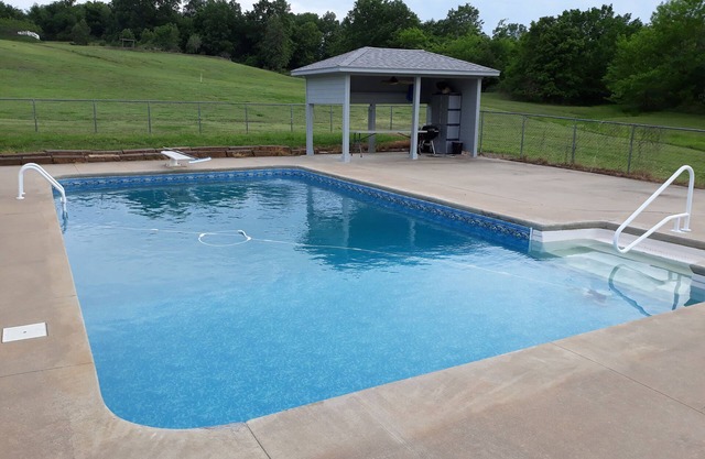 Country lake retreat with Pool and Boat Dock!nCozy + food/attractions nearby!