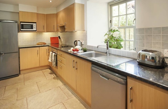 Courtyard House is a restored wing of a large Victorian Farmhouse and sleeps six within a rural loca