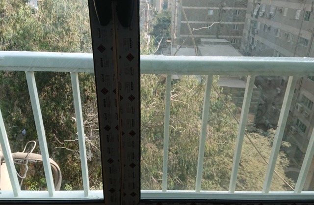 Cozy 2-bedroom apartment in pleasant Mohandesin with WiFi, AC