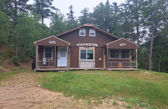 Cozy cabin nestled on 20 private acres, hiking trail and pet friendly.