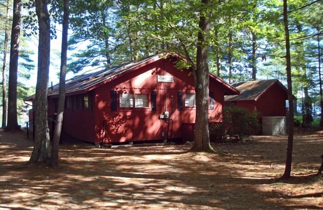Cozy camp with large sandy beach and excellent views of Little Sebago.
