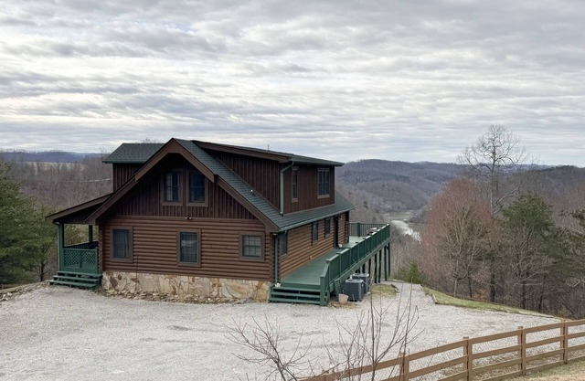 Cozy home with stunning views, fire pit, and large fenced in yard