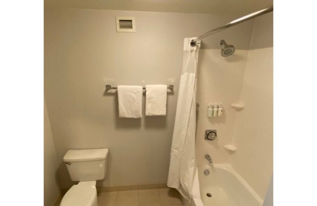 Cozy hotel room with balcony near airport