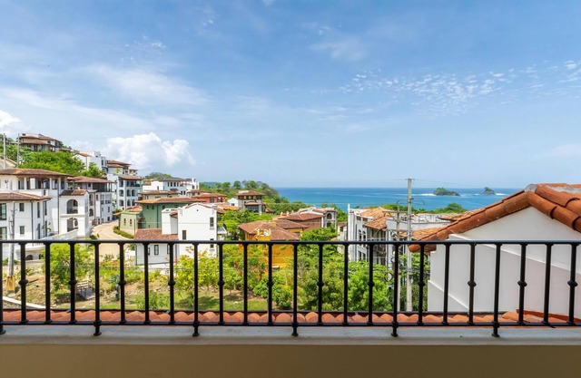 Cozy Ocean View Condo, Balcony with nature views- At Las Catalinas