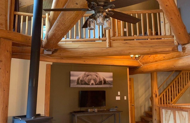 Custom built log home surrounded by lakes