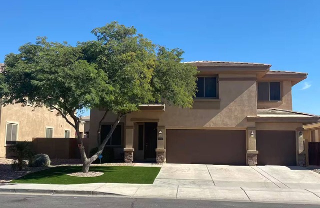 Custom home with 5 Beds & 5.5 Baths! A heated pool & spa make the backyard feel like a resort