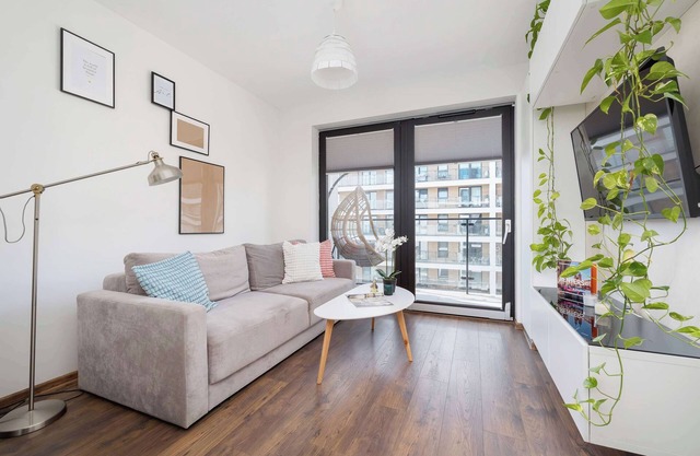 Dąbska 24 Kraków | Light Grey Apartment with Balcony