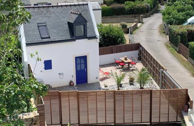 Detached fisherman's cottage on the seafront with large terrace and parking space