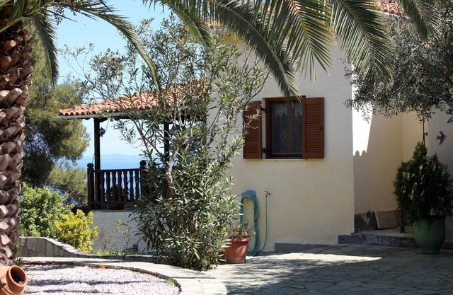 Detached holiday home with unique sea view, perfect located at the sea, Wifi | A