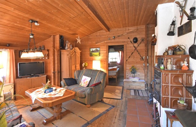 Detached wooden house with fireplace