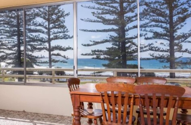 Directly across the road from Burleigh Beach.