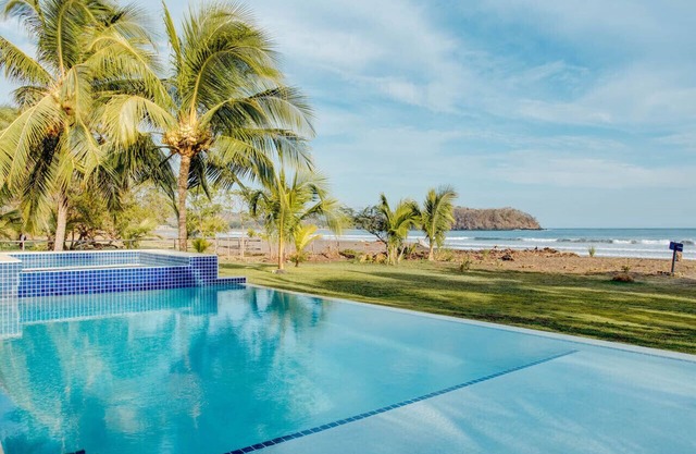 Directly on beach with private pool, Sleeps 11+, not a 10 min walk as VRBO says