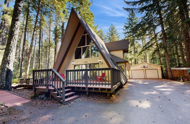 Dog-friendly, A-frame cabin with private hot tub - tranquil setting near skiing