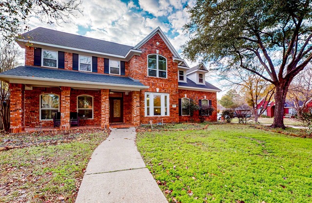 Dog-friendly charmer with enclosed yard, patio, pool, game room, W/D, & AC