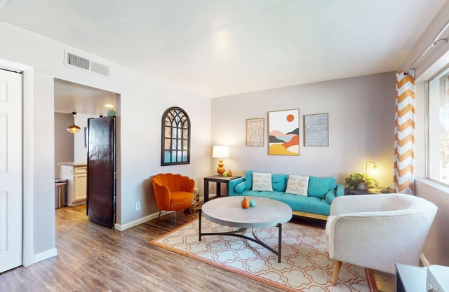 Dog-friendly condo near attractions with fenced yard, central AC, and cute decor