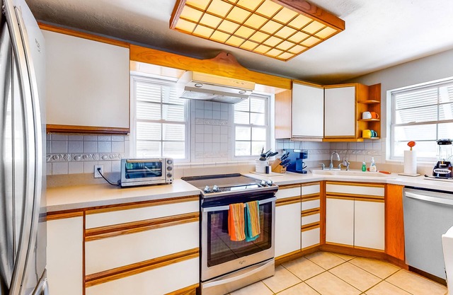 Dog-friendly escape with private dock, porch, balcony, water view, & central AC