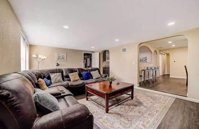 dog-friendly home with fenced yard, grill, sunroom