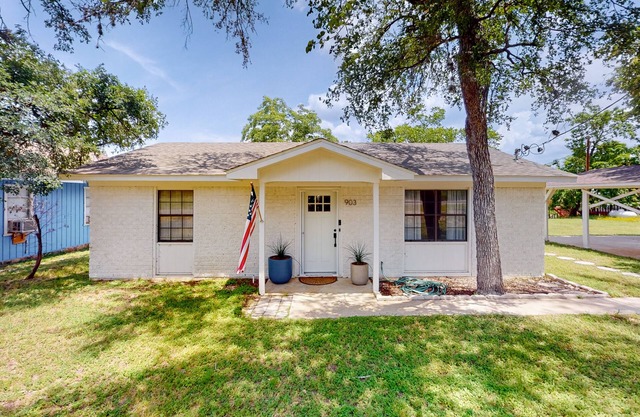 Dog-friendly waterfront home with dock, grill, water views, patio, washer/dryer