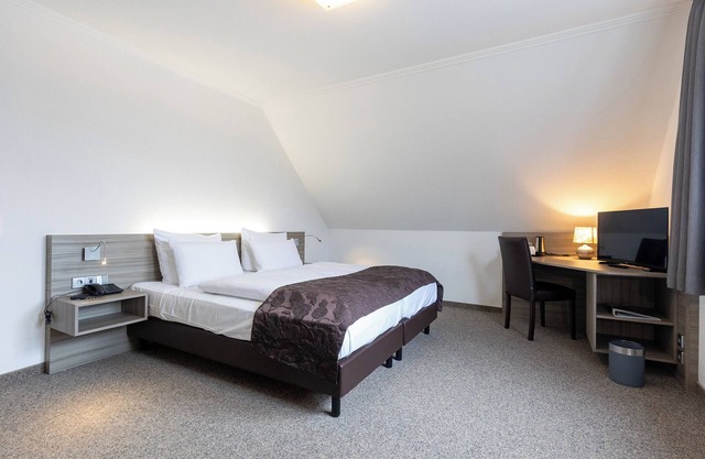 Double room 114. Airy and with sofa.
