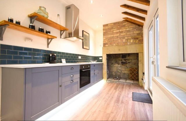 Dougie's Den, charming stone built mid-terrace town house .