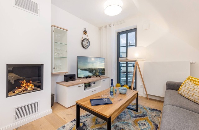 Dream apartment with fireplace only 200 meters from the beach.
