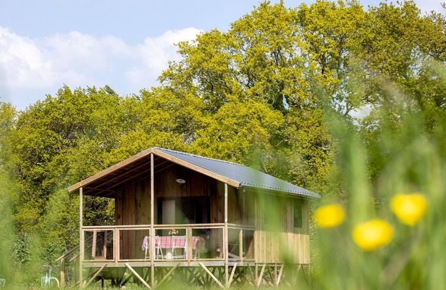 Ecolodge with swimming pool surrounded by nature and 10 minutes from the beach!