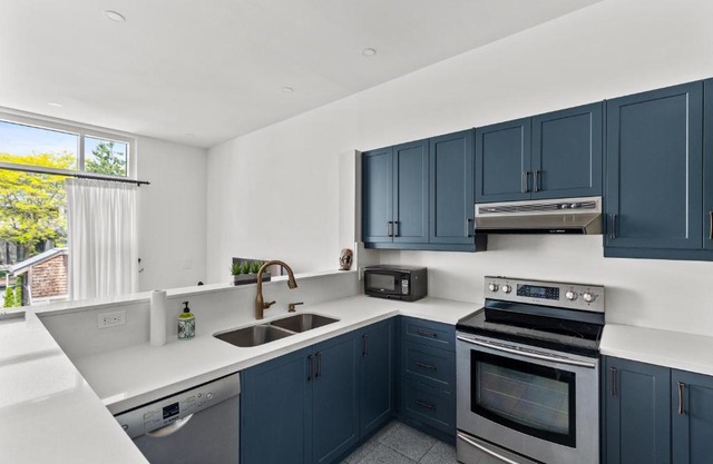 Elegant 3 Bedroom 4 Story Townhouse with Rooftop Terrace