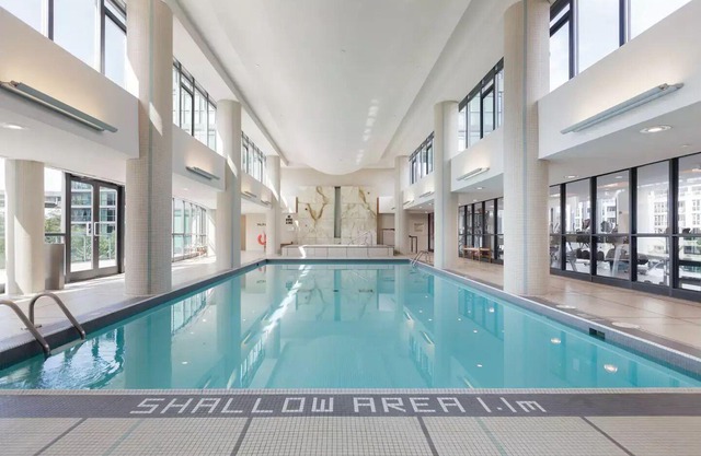 Elegant Downtown Oasis with City and Lake Views Plus Parking