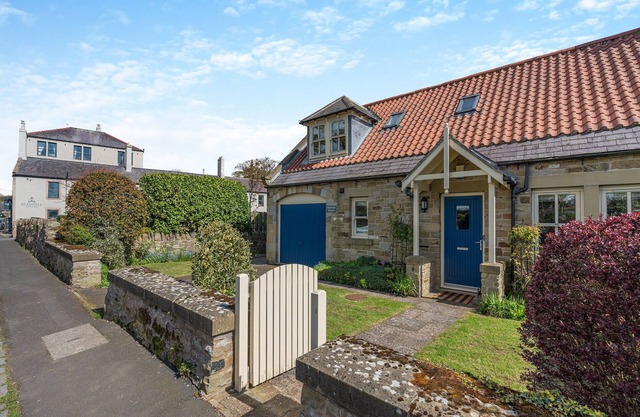 Embrace Coastal Comforts by the Fire: Your Perfect Retreat Awaits in Beadnell.