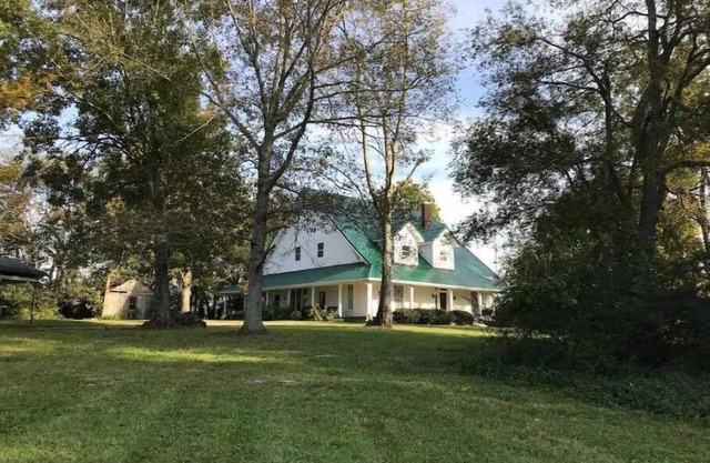 Enchanting 1915 farmhouse on 5 serene acres