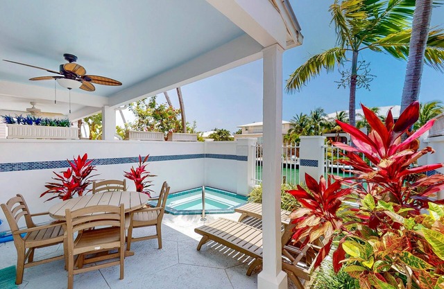 Enchanting waterfront townhouse with balcony, plunge pool, & washer/dryer
