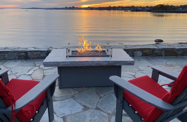 Enjoy endless harbor activity and waterfront sunsets over NYC skyline
