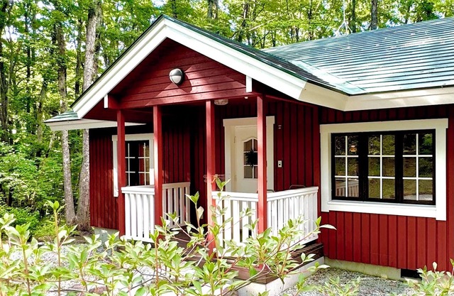 Enjoy a private sauna and authentic charcoal BBQ in the quiet forest of Kita-Karuizawa at the bright red Finland House.