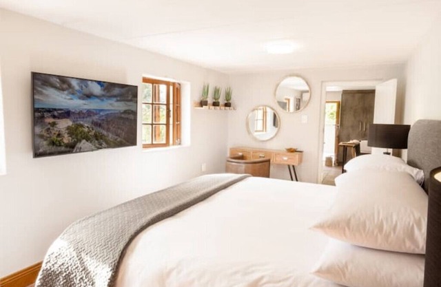 Enjoy magical views from the pool-side a few minutes from the heart of Stellies!