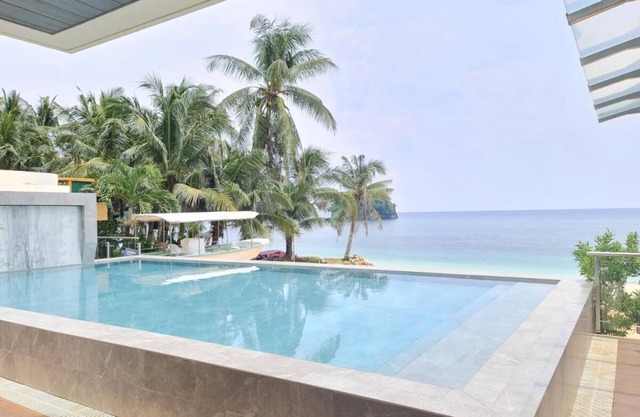 Enjoy the tranquility of a beachfront resort in Boracay Island.