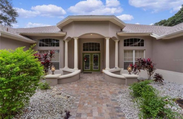 Escape to Luxury: Designer Pool Home in Harmswood of Belle Aire, The Villages