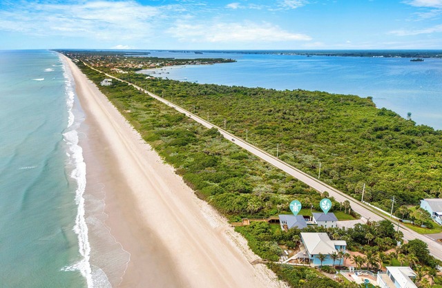 Escape to your own slice of paradise with this stunning oceanfront home with private pool, spa & beach!