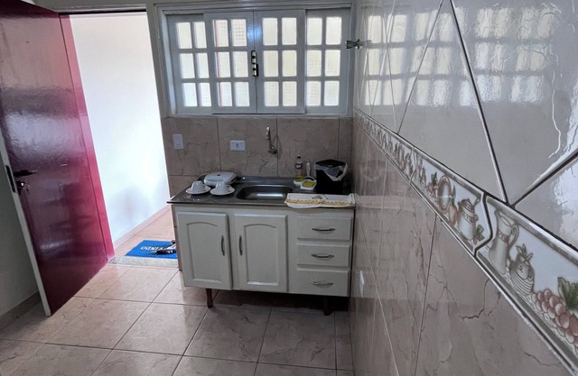 Espaço Aconchegante com Banheiro, Cozinha e Quarto Privativos