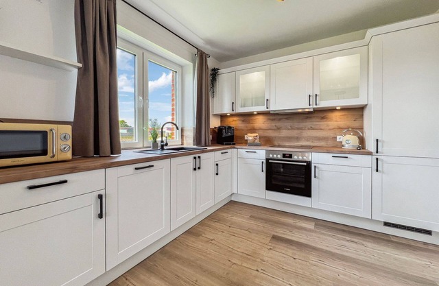 Exclusive, modern new-build semi-detached house with garden for up to 8 people