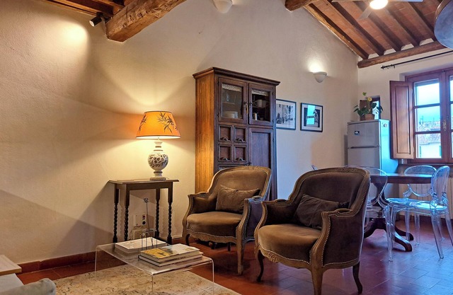 Exclusive retreat in the historic center of Lucca, overlooking Piazza Anfiteatro